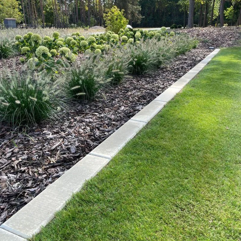 Efektywne sposoby na odgrodzenie rabaty od trawnika